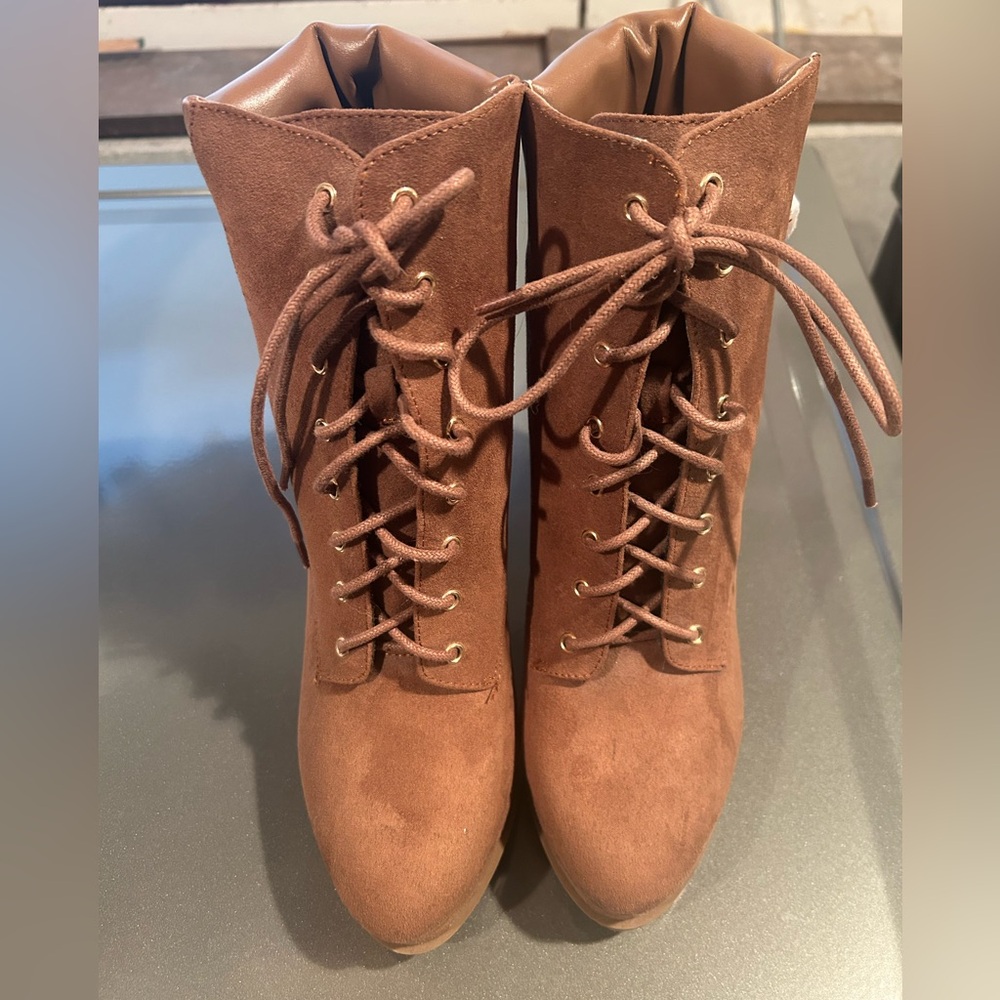 Shoedazzle bootie heels. Size 10. Never worn. Paper still on the metal. No box.
